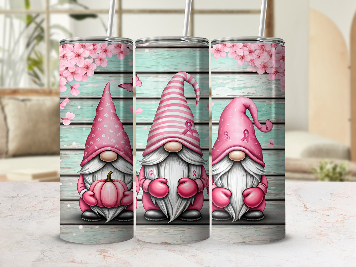 Three pink gnomes with pink ribbon awareness symbols and stripes.