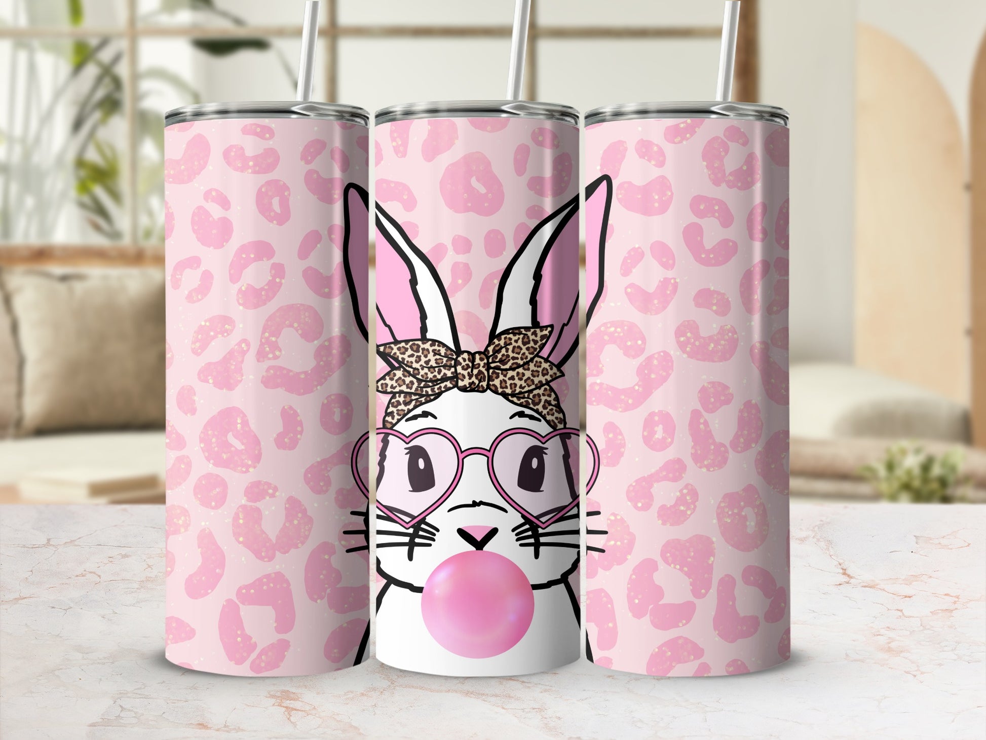 Pink leopard print tumbler featuring a bunny blowing a pink bubblegum.