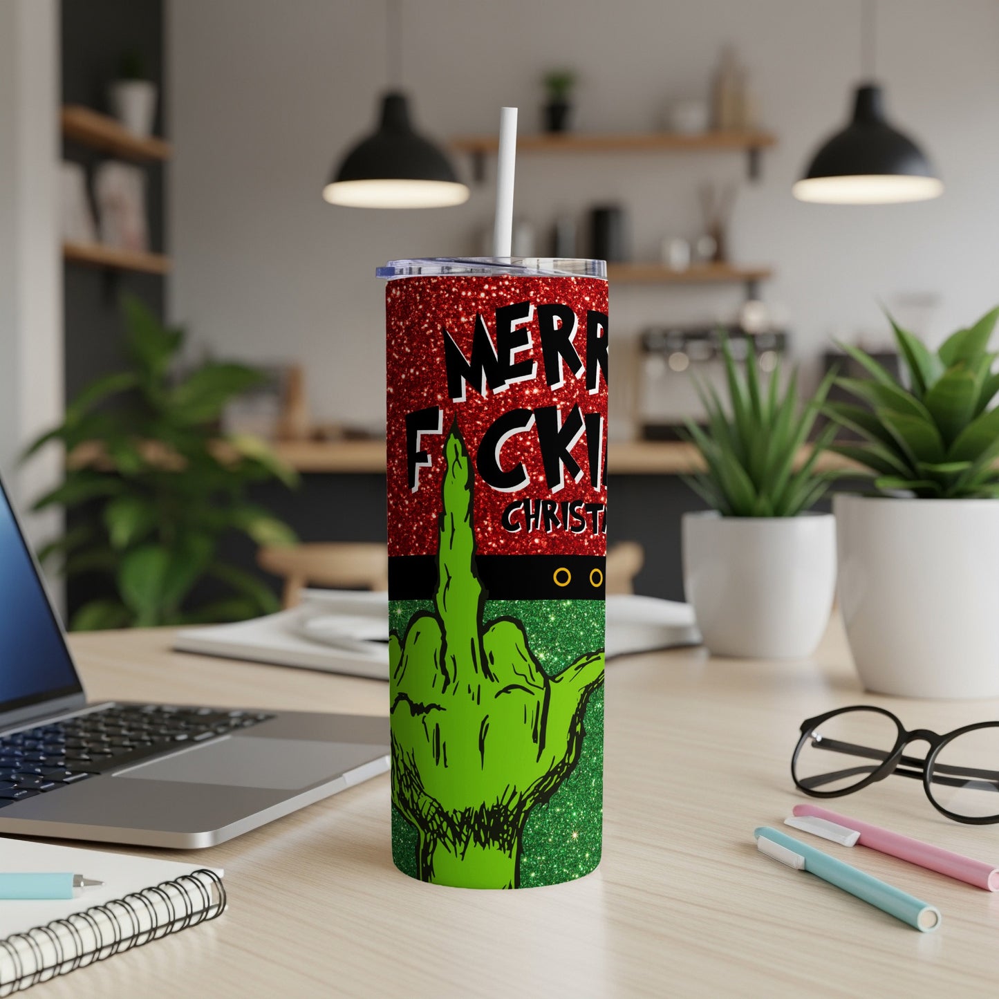 Green glitter tumbler with middle finger and "Merry F\*cking Christmas" text.