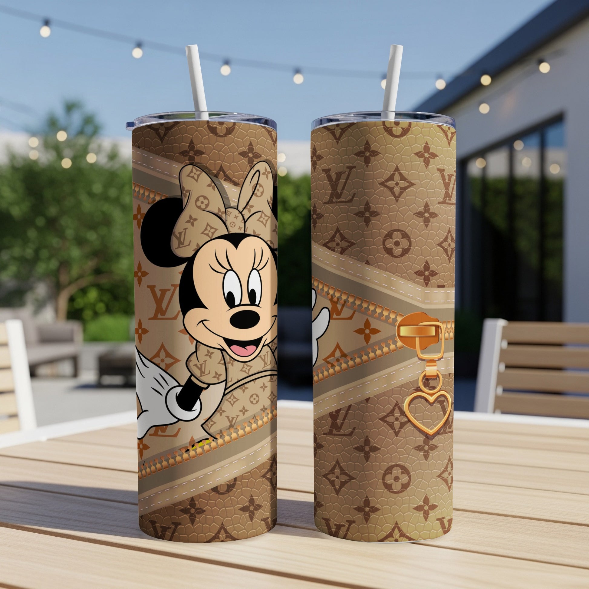 Minnie Mouse in brown designer pattern tumbler with gold zipper and heart charm.