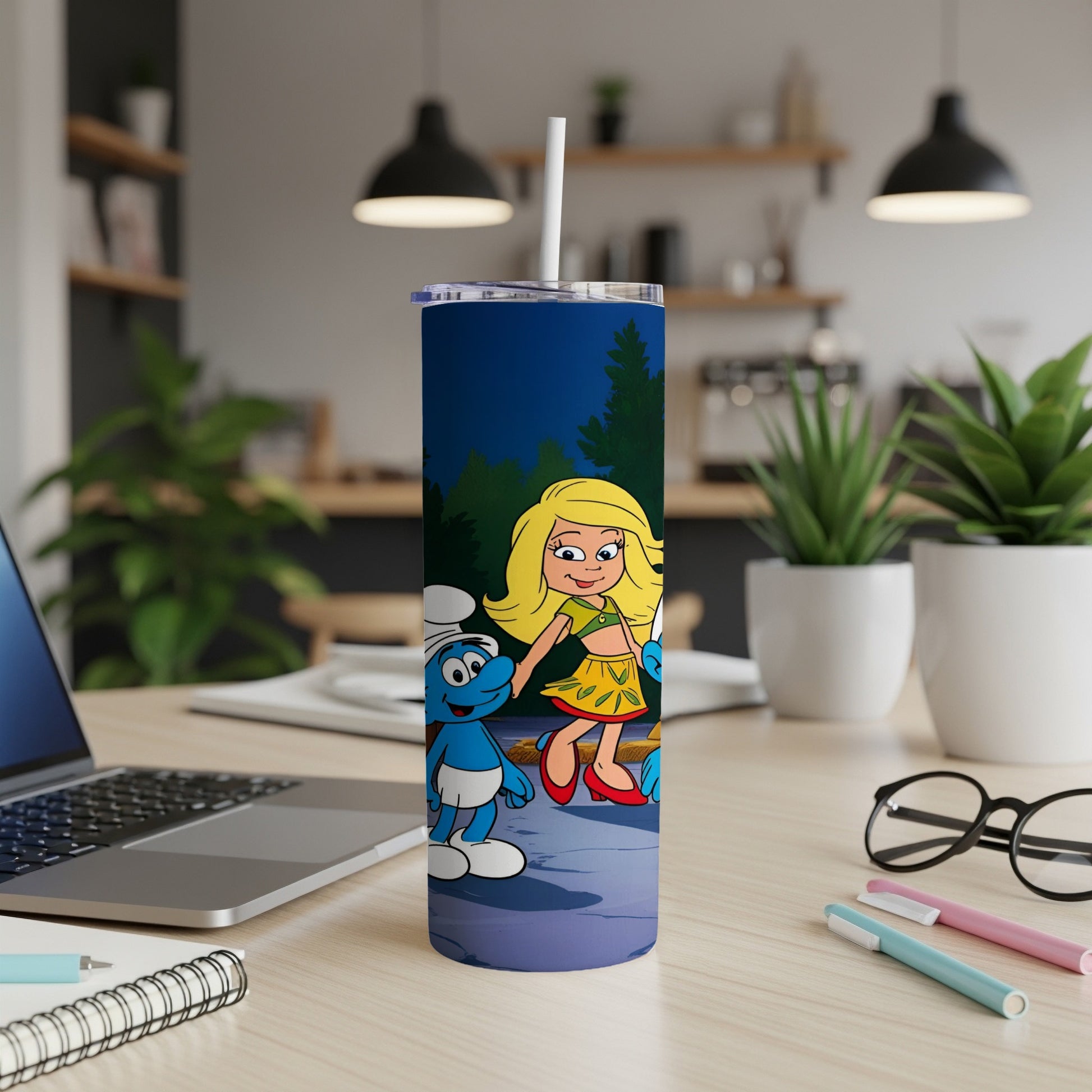 Smurf and Blondie characters on a blue tumbler with a straw.