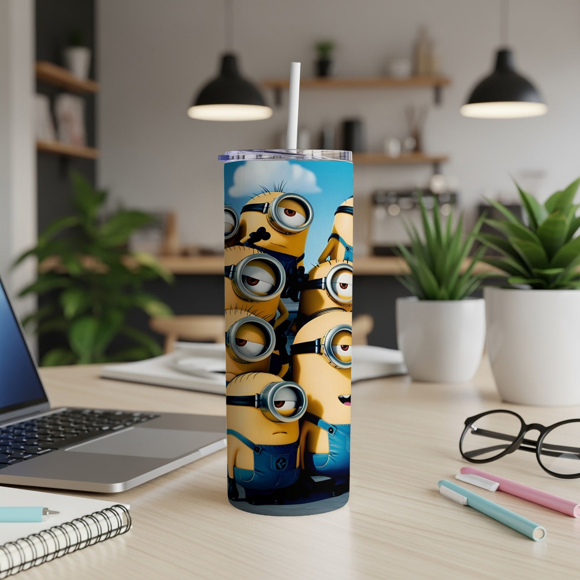 Minions characters on a blue background, on a tumbler with a straw.