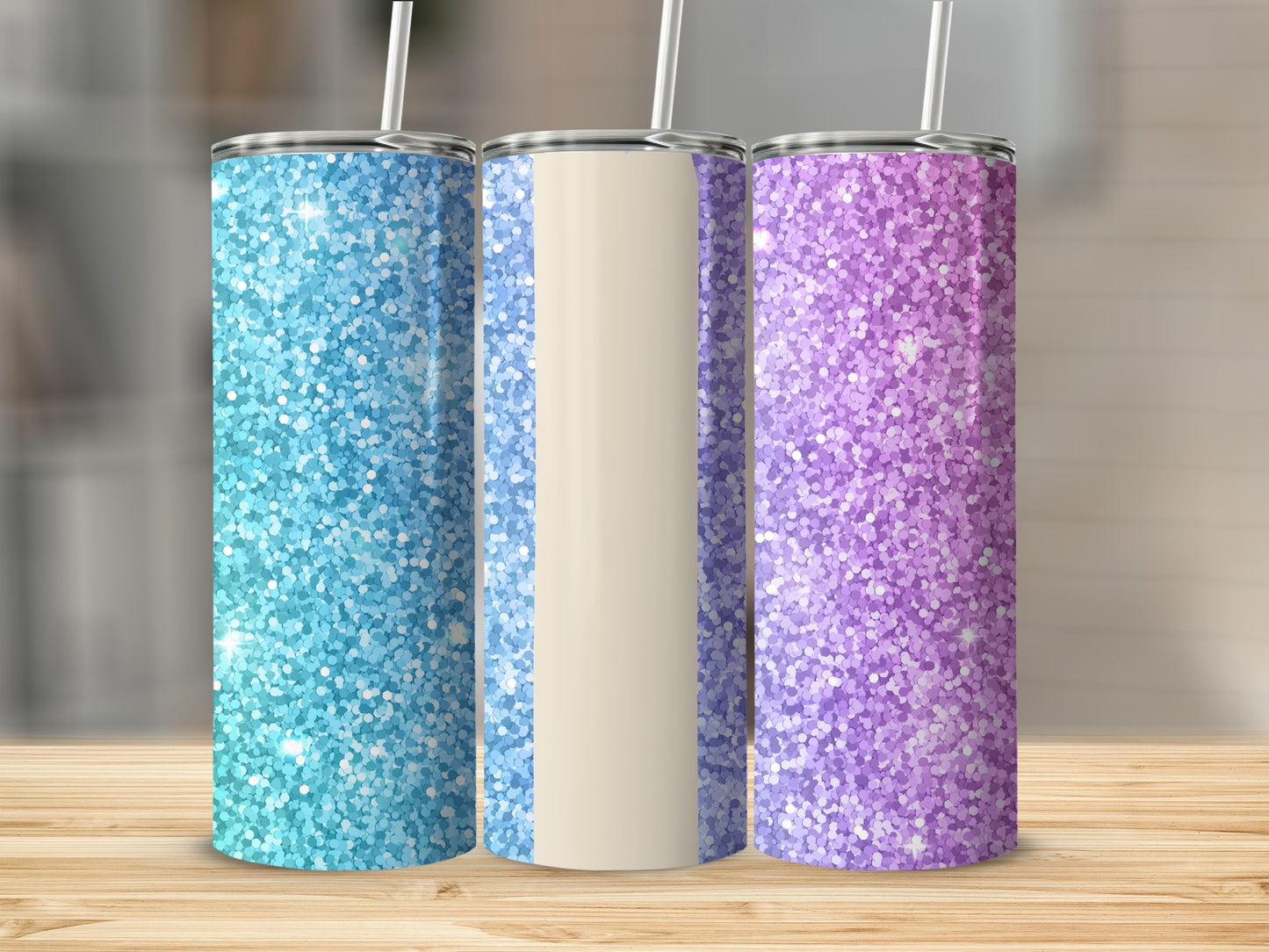 Three glitter tumblers with straws, blue, cream, and purple.