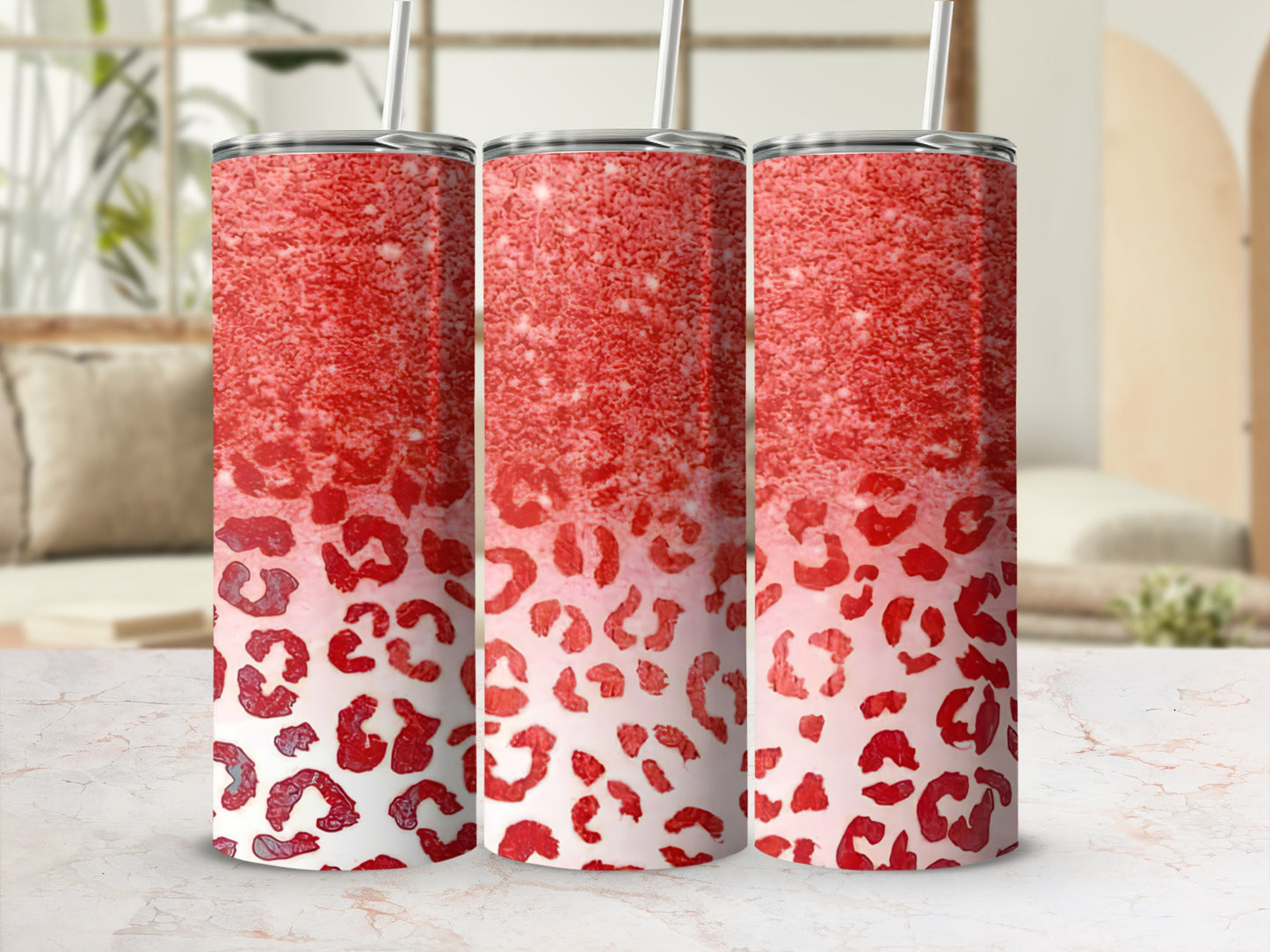 Three red glitter tumblers with a leopard print bottom.