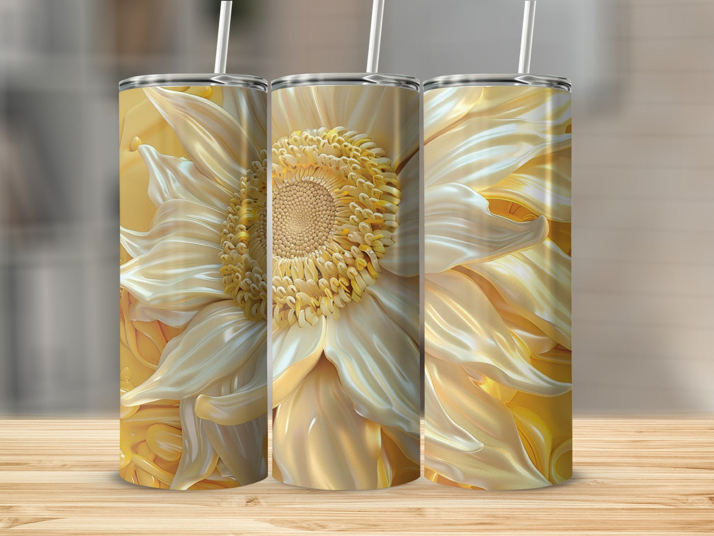Three tumblers with a detailed, golden sunflower design.