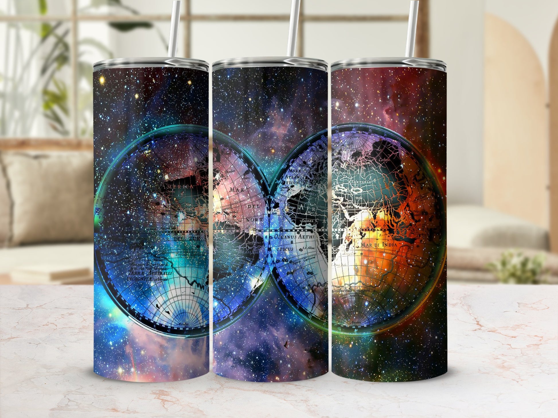 Three tumblers with a nebula galaxy and antique world map design.