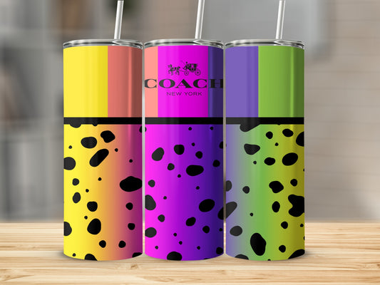 Three tumblers with colorful ombre stripes and black spots, one featuring Coach New York logo.