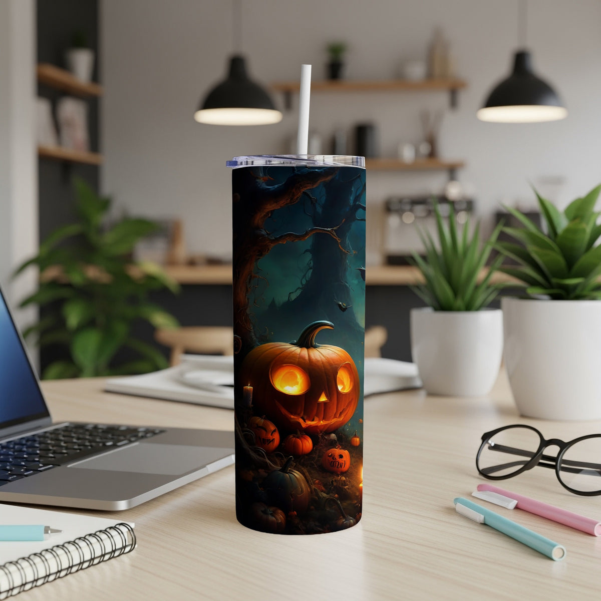 Tall tumbler with a spooky jack-o'-lantern and forest Halloween design.