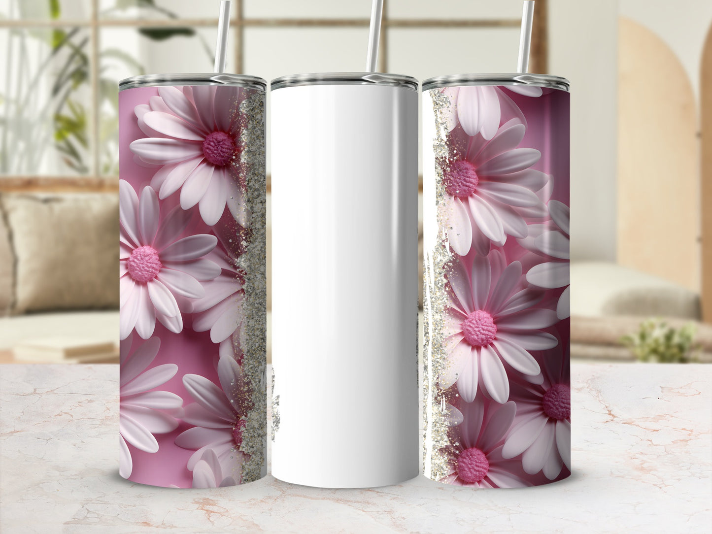 Three tumblers, two with pink flowers and glitter, one blank.