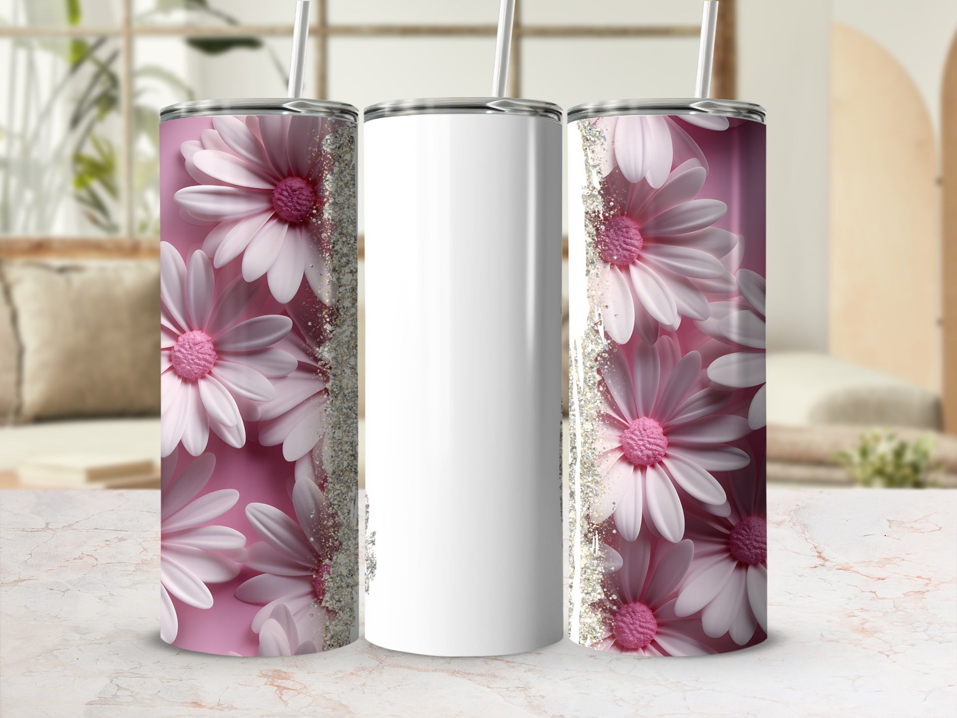Three tumblers, two with pink flowers and glitter, one blank.