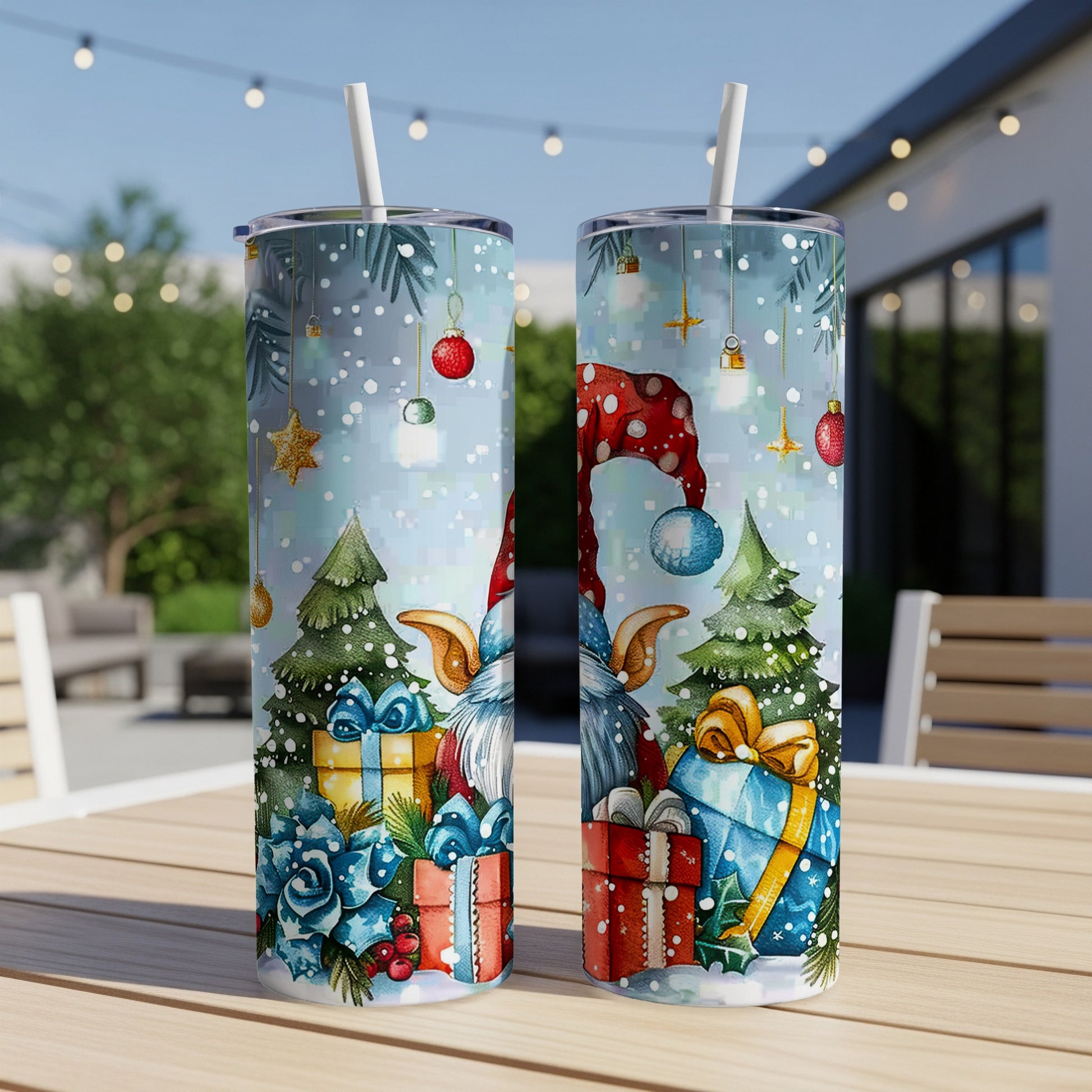 Two tumblers featuring a gnome, Christmas trees, and wrapped presents against a snowy backdrop.