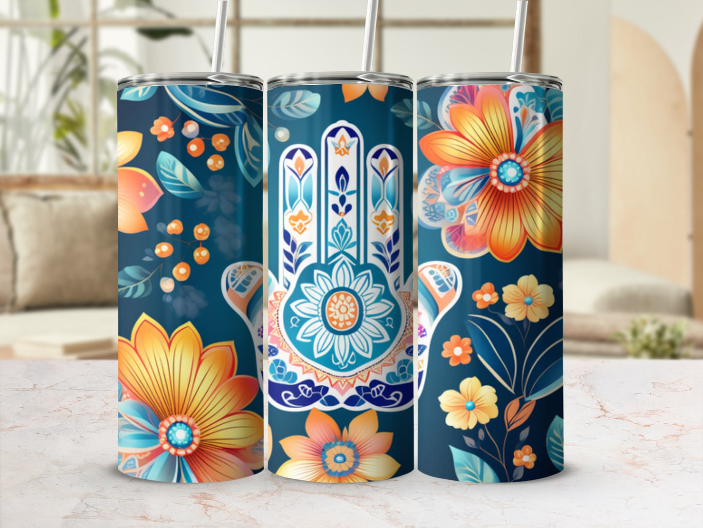Tumbler with teal background, Hamsa hand and floral designs.