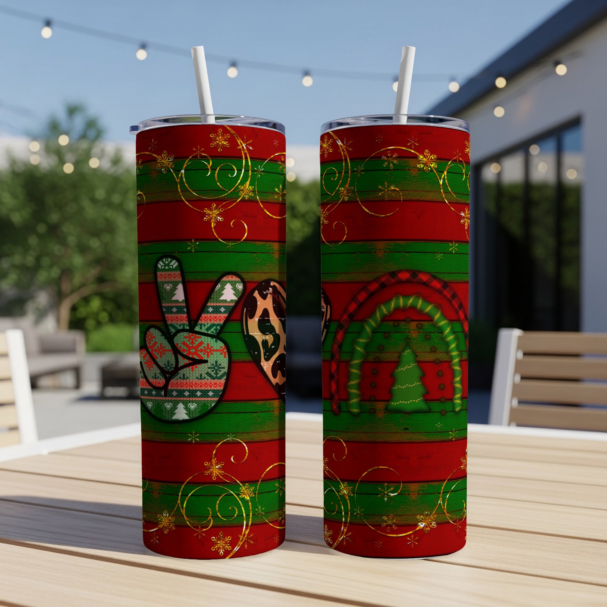 Two tall Christmas-themed tumblers with peace sign and rainbow designs.