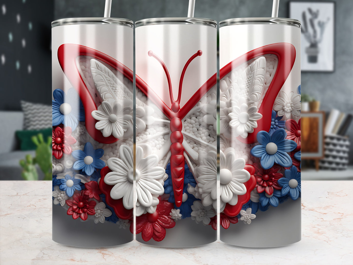 Silver tumbler with a large red butterfly and red, white, and blue flowers.