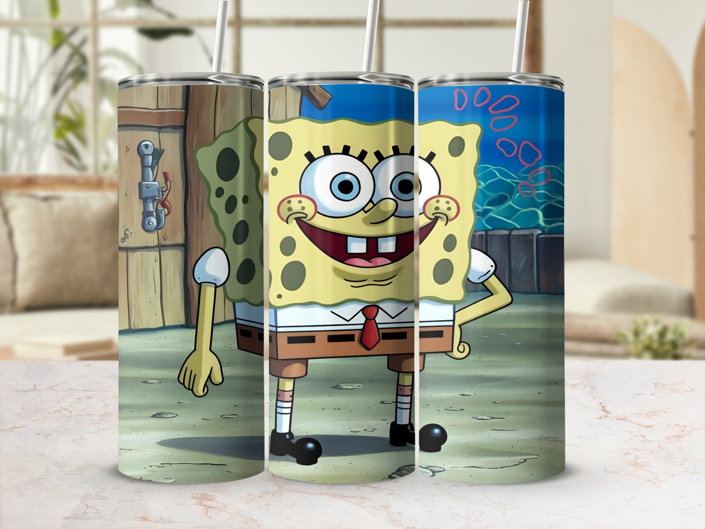 SpongeBob SquarePants character on three tumbler cups with straws.