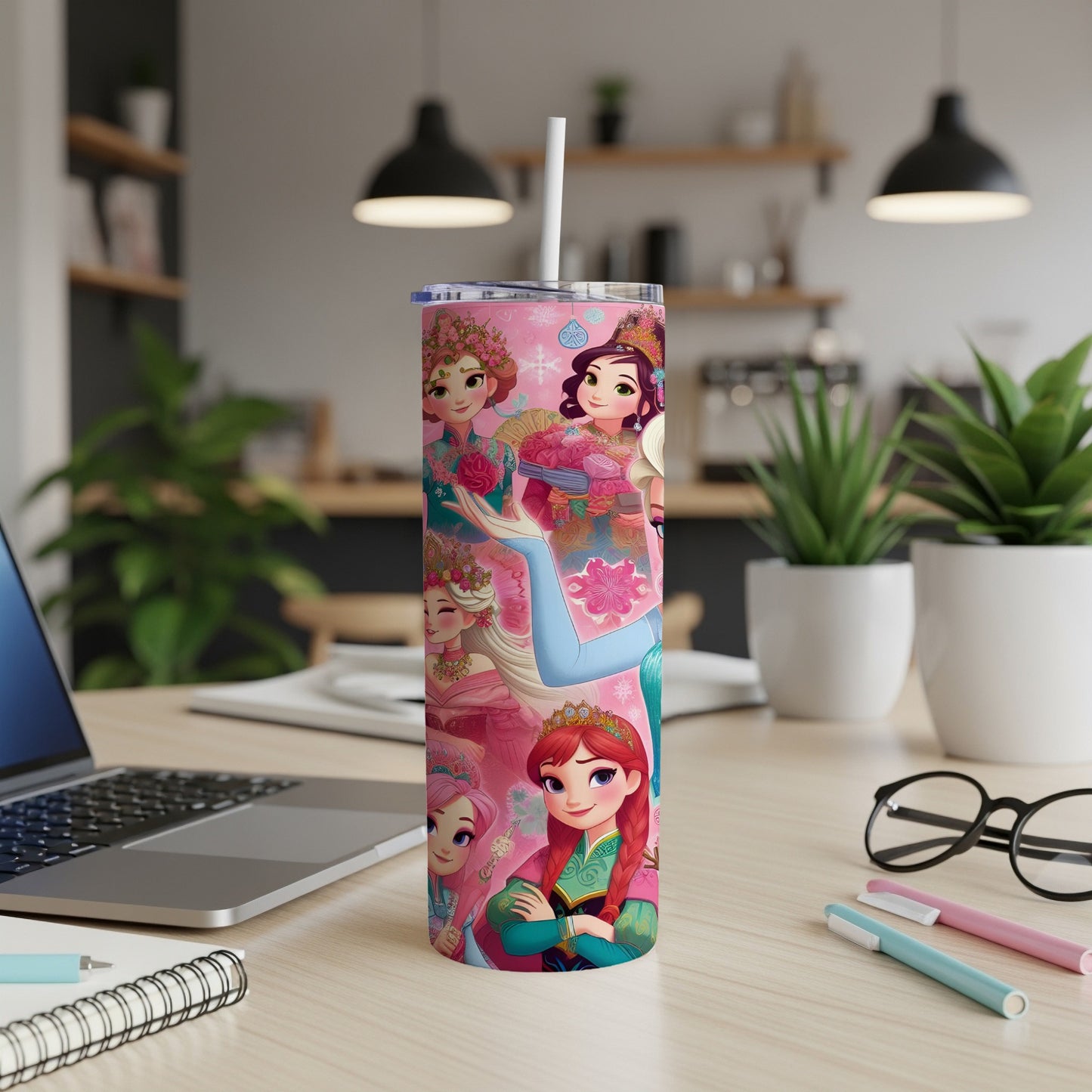 Pink tumbler with cartoon princesses and floral accents.