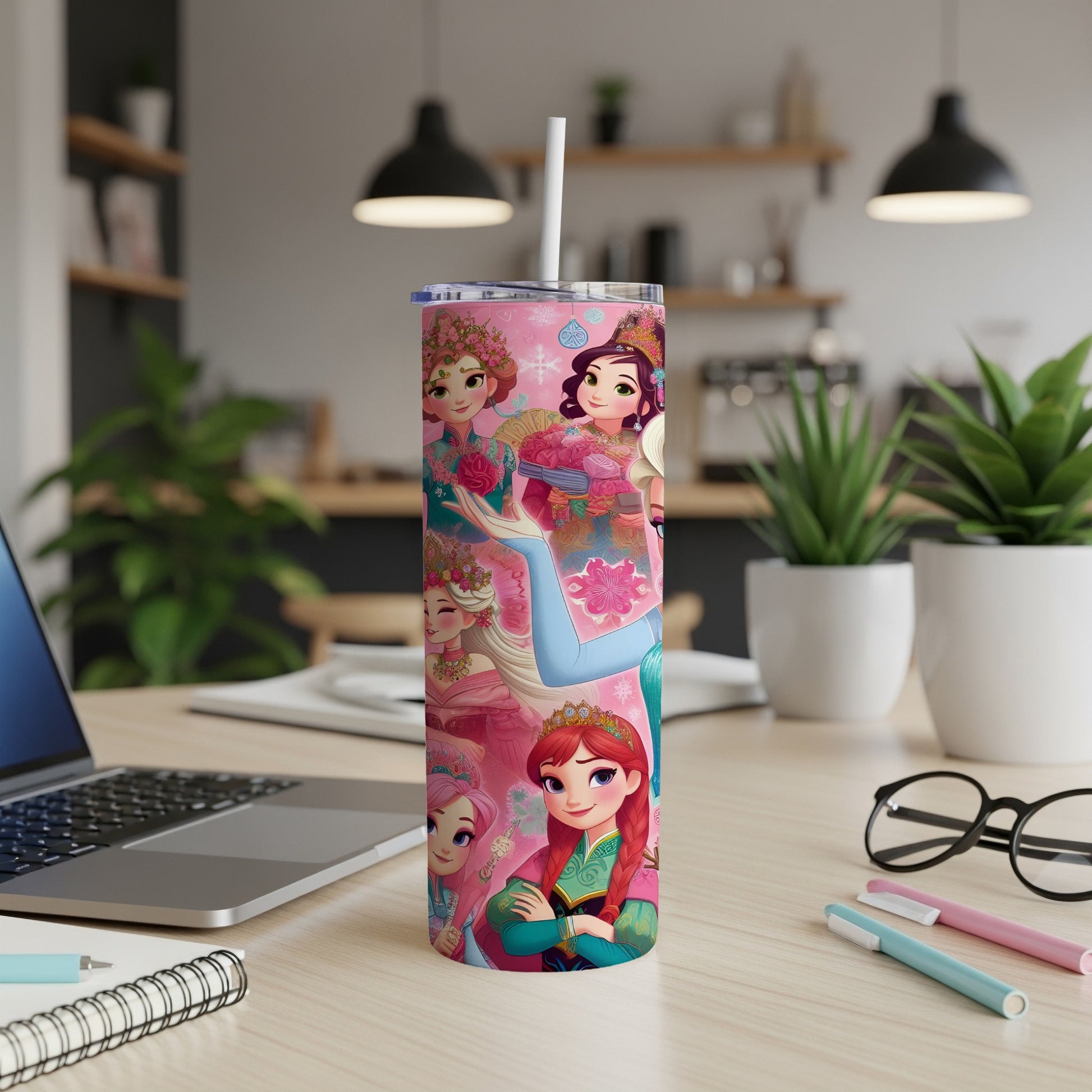 Pink tumbler with cartoon princesses and floral accents.