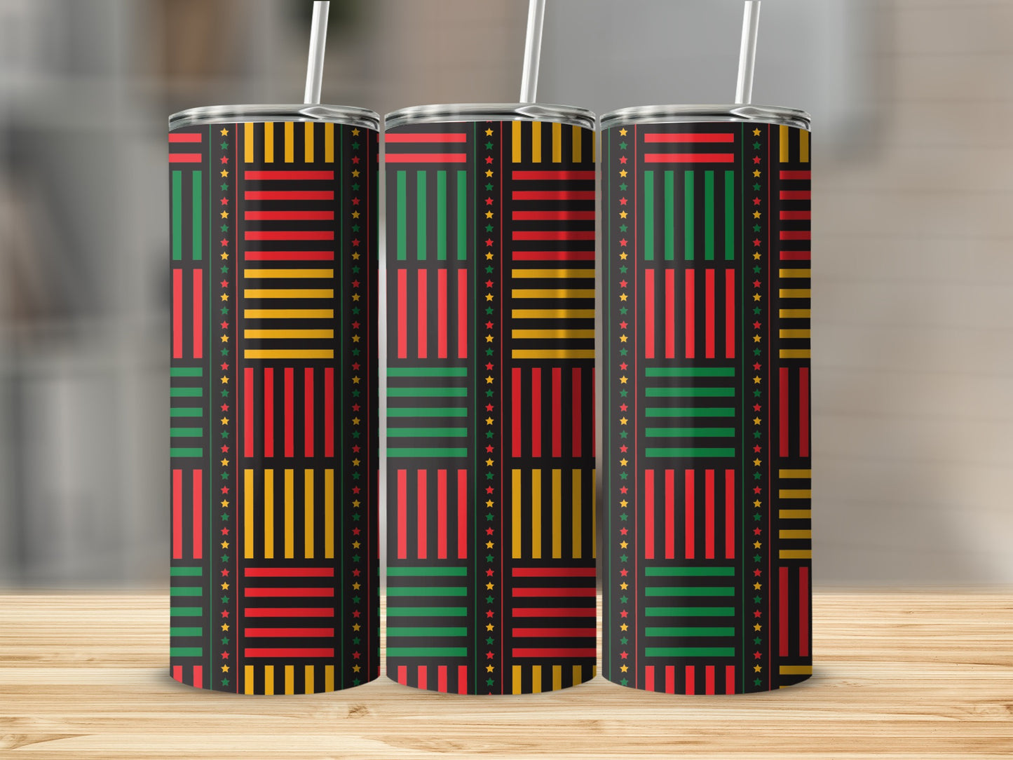 Three tumblers with a black background and a red, yellow, and green striped pattern with stars.
