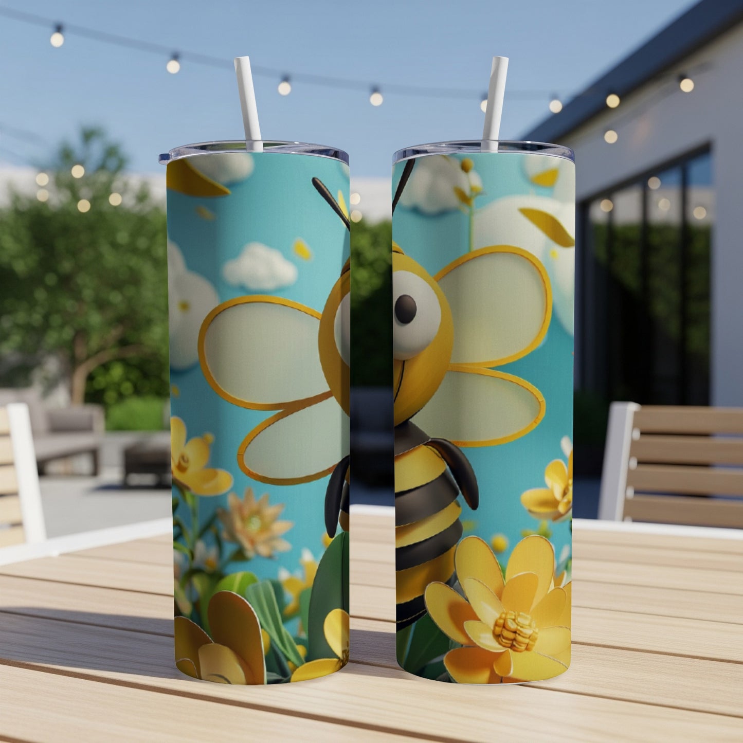 Two identical tumblers featuring a smiling cartoon bee and yellow flowers.