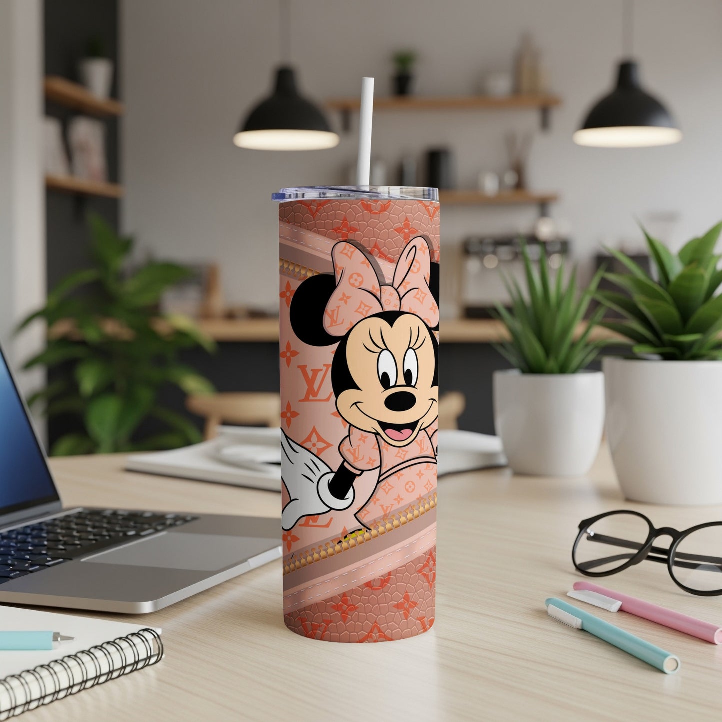 Minnie Mouse in LV pattern on a tumbler with a straw.