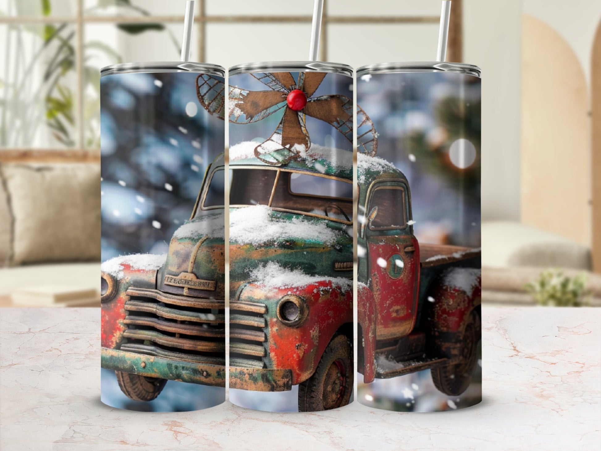 Vintage red truck with snow and Christmas decorations on a wooden surface.