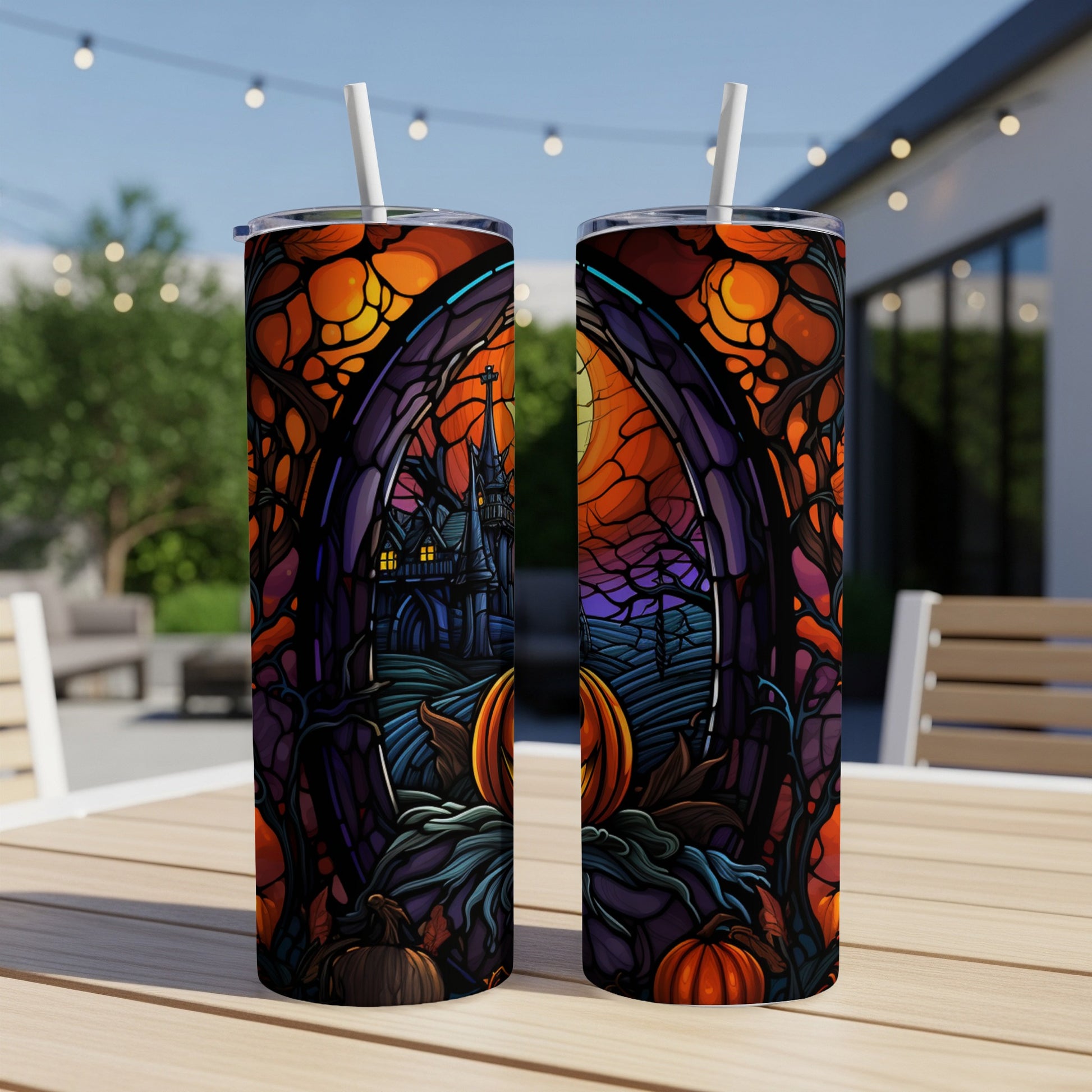 Halloween scene with stained glass, pumpkins, and a castle on a tumbler.