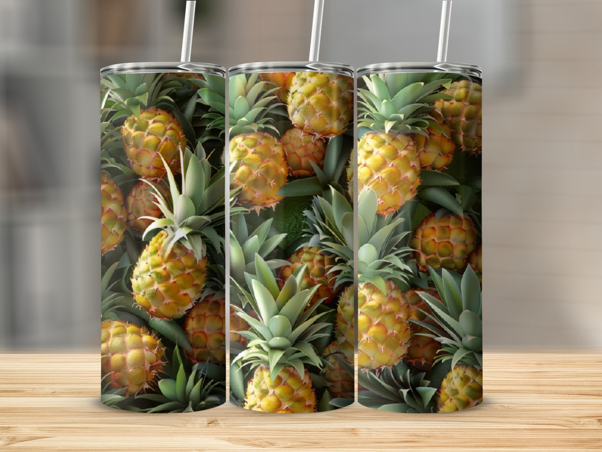 Three tumblers featuring a repeating pattern of ripe pineapples.