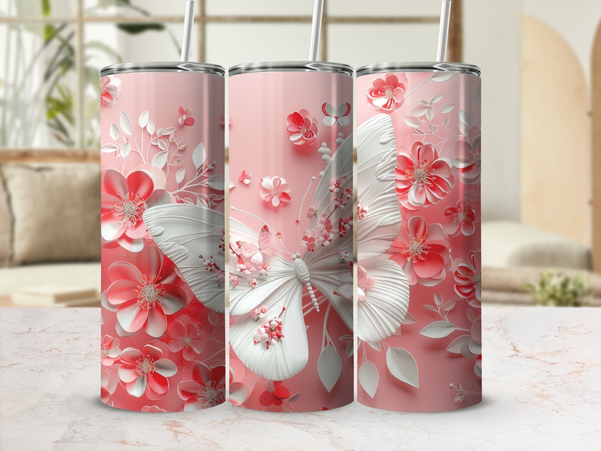Pink tumbler with butterfly and floral design.