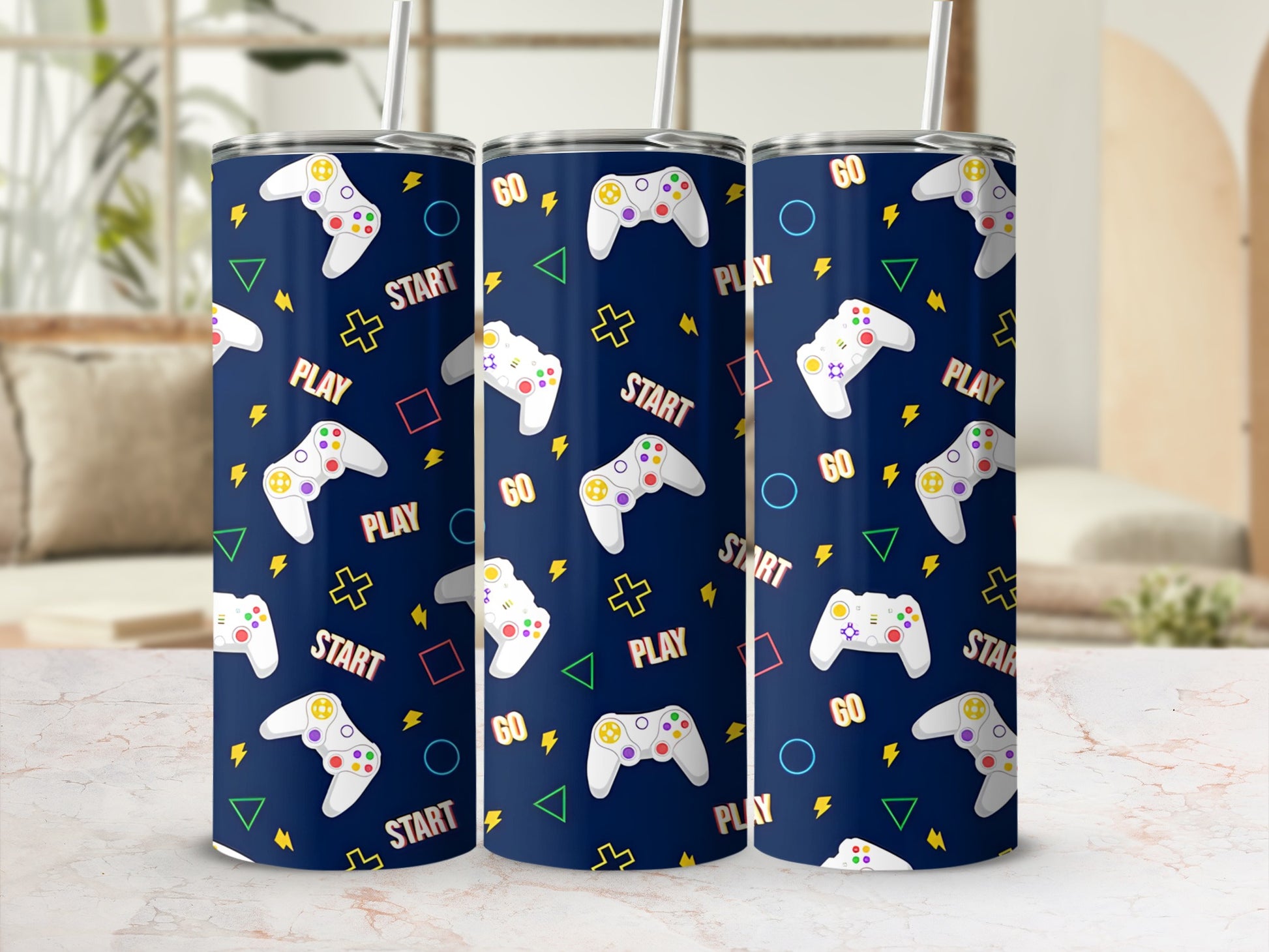 Navy tumbler with gaming controllers, shapes, and "Start," "Play," and "Go" text.