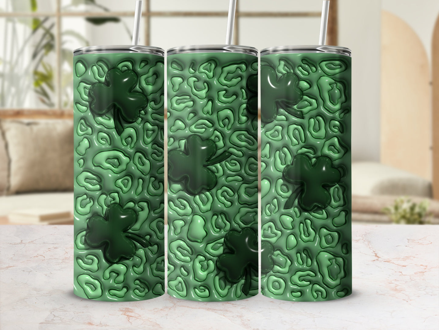 Green shamrocks on a textured, rippled green tumbler.