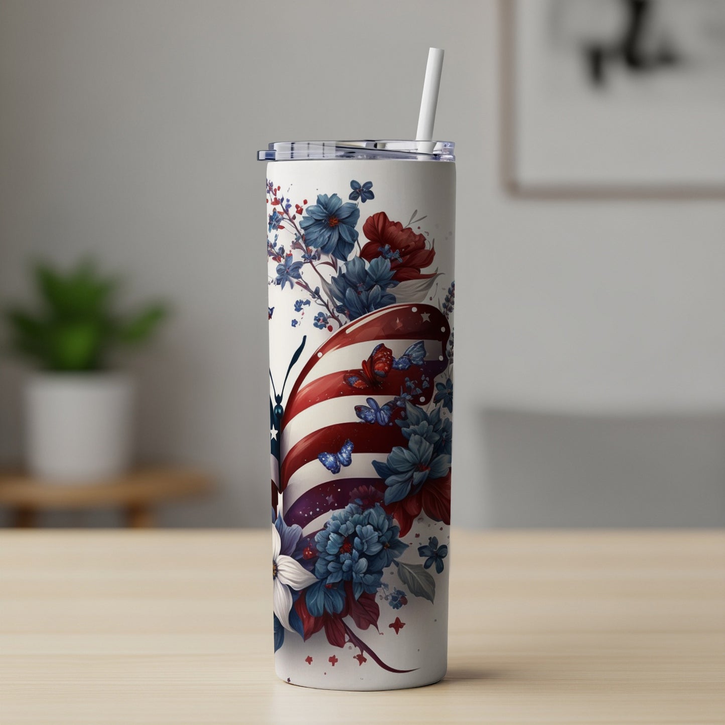 Tall tumbler with American flag butterfly and floral design.