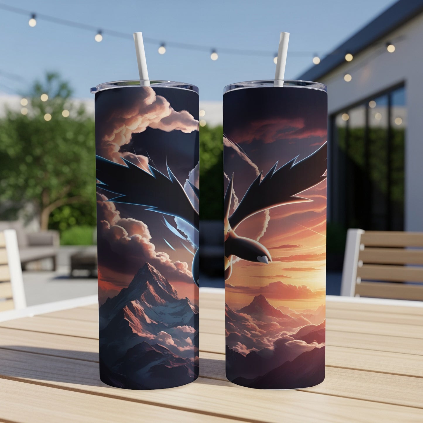 Two tumblers featuring a winged creature soaring over mountains at sunset.