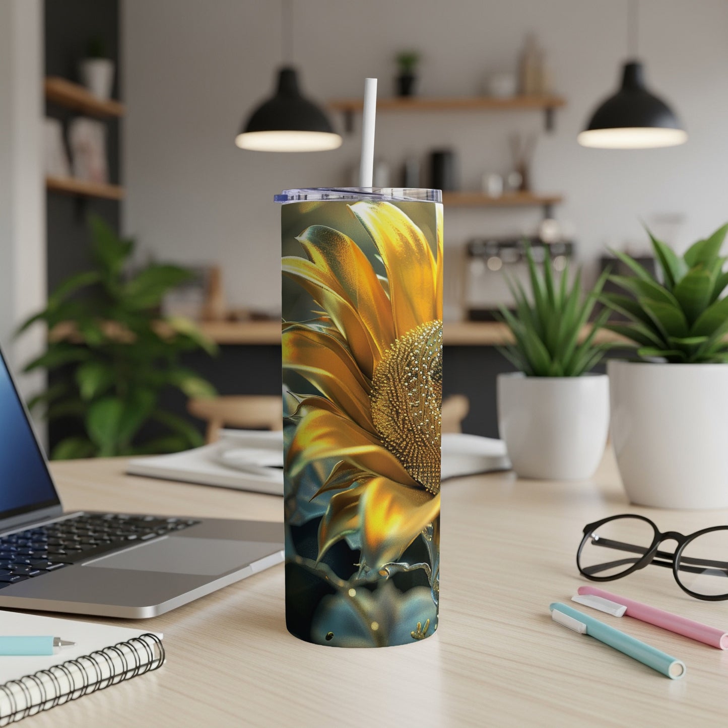 Tall tumbler with a close-up sunflower design on a desk.