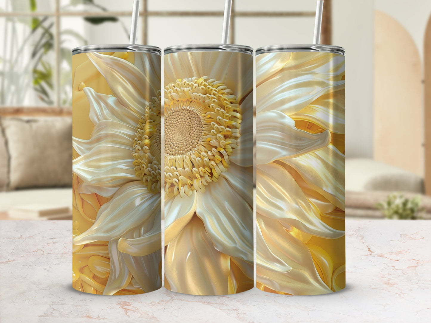 Three golden sunflowers on a marble countertop with a blurred background.