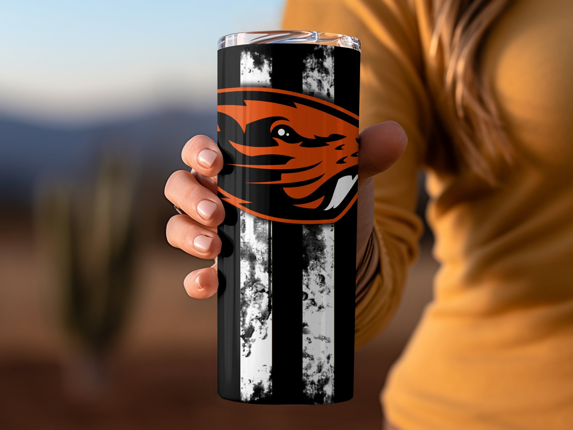 Black and Orange Striped Tumbler with Animal Logo