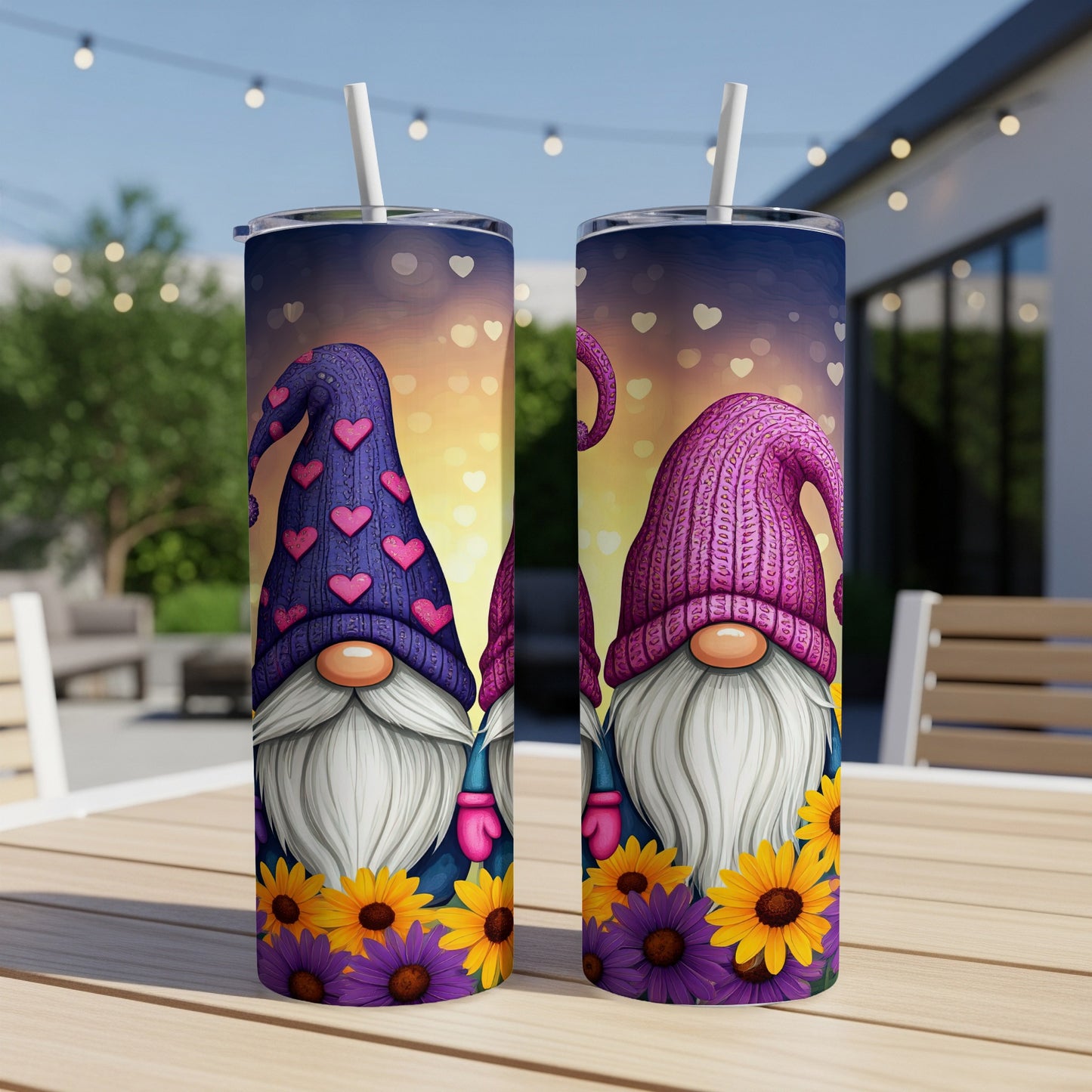 Two gnomes with pink hats and purple heart patterns on a floral background.