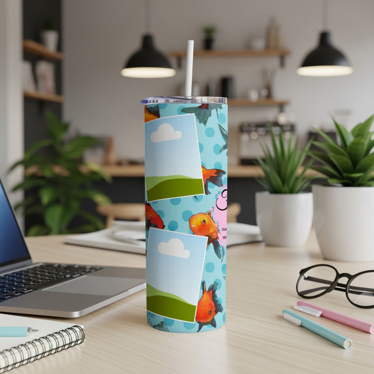 Blue tumbler with cartoon goldfish and cloud print, featuring photo frames.