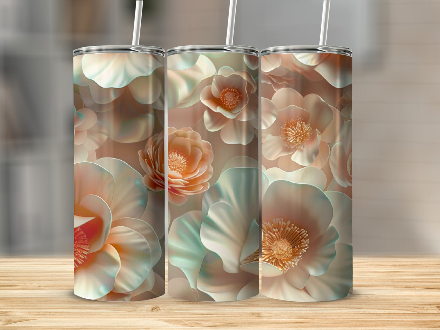 Three seamless tumblers with a floral pattern of peach and cream flowers.