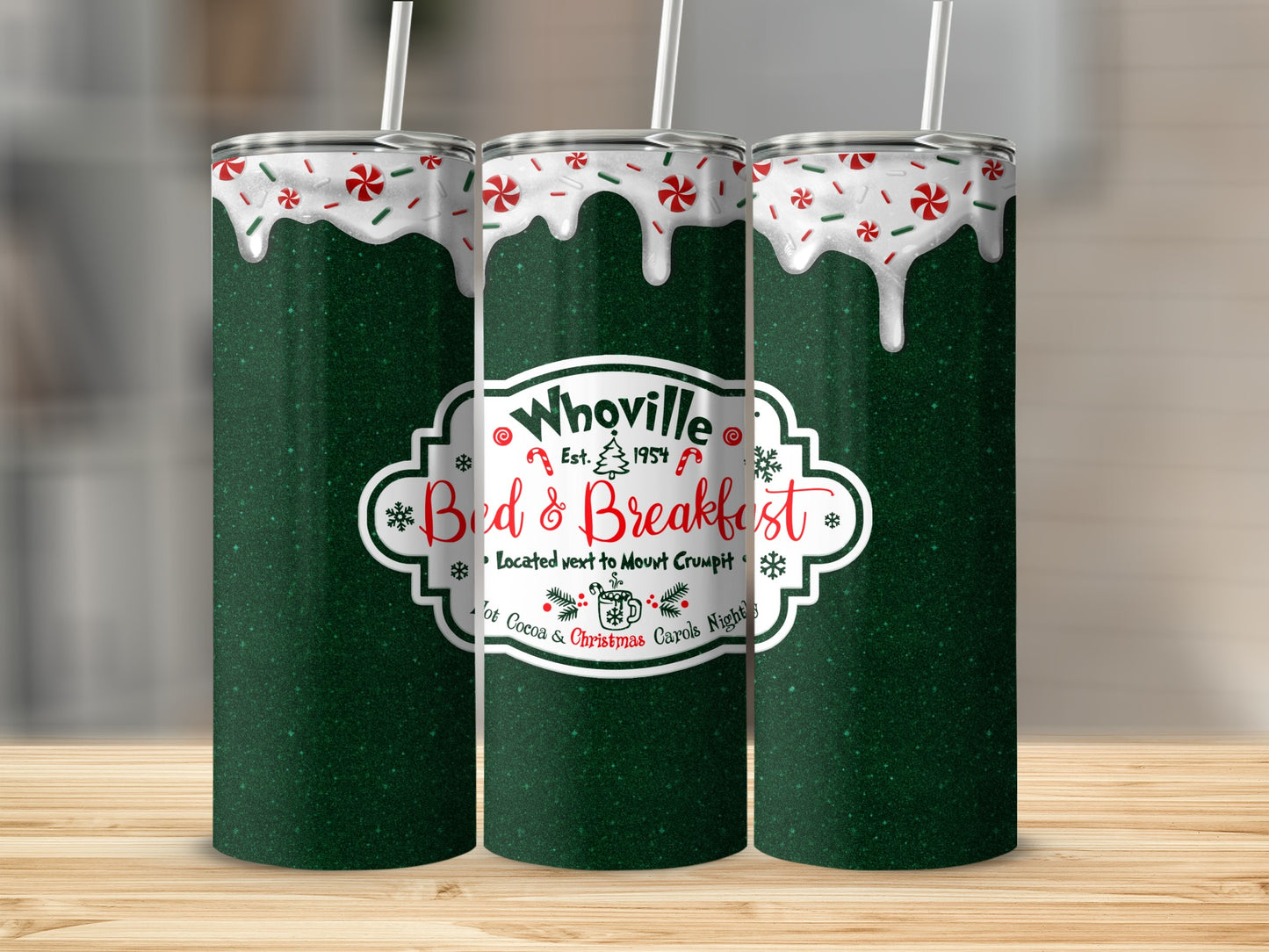 Whoville Bed & Breakfast tumbler with green glitter and white icing drips.