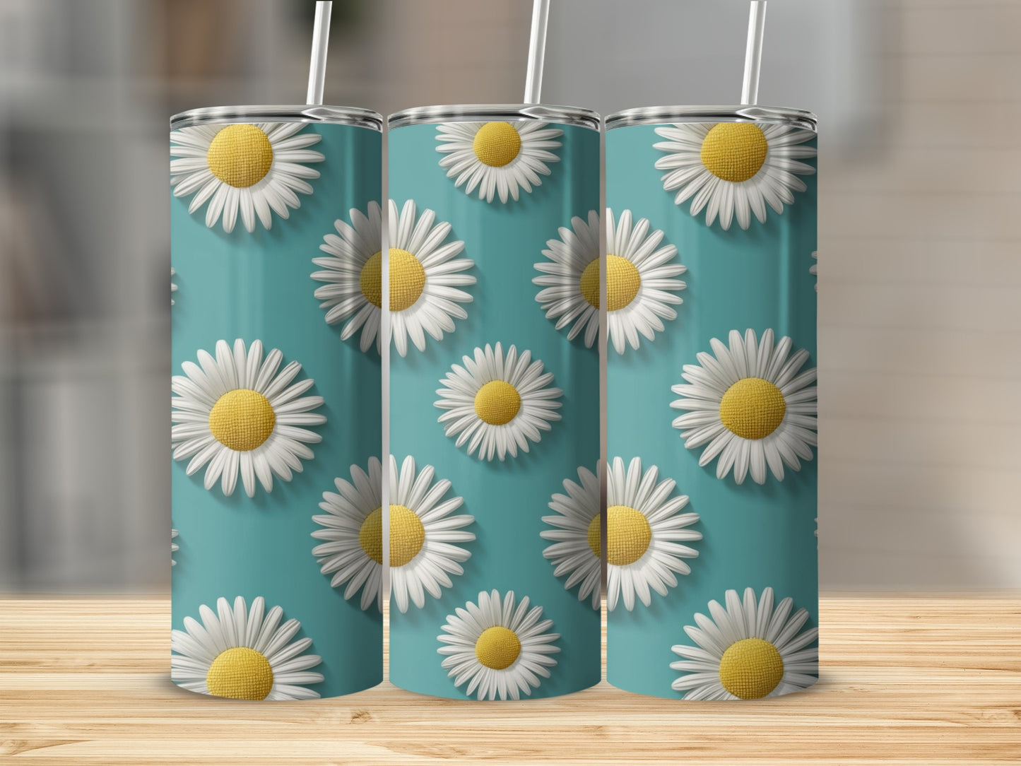 Three tumblers with a repeating white daisy pattern on a teal background.