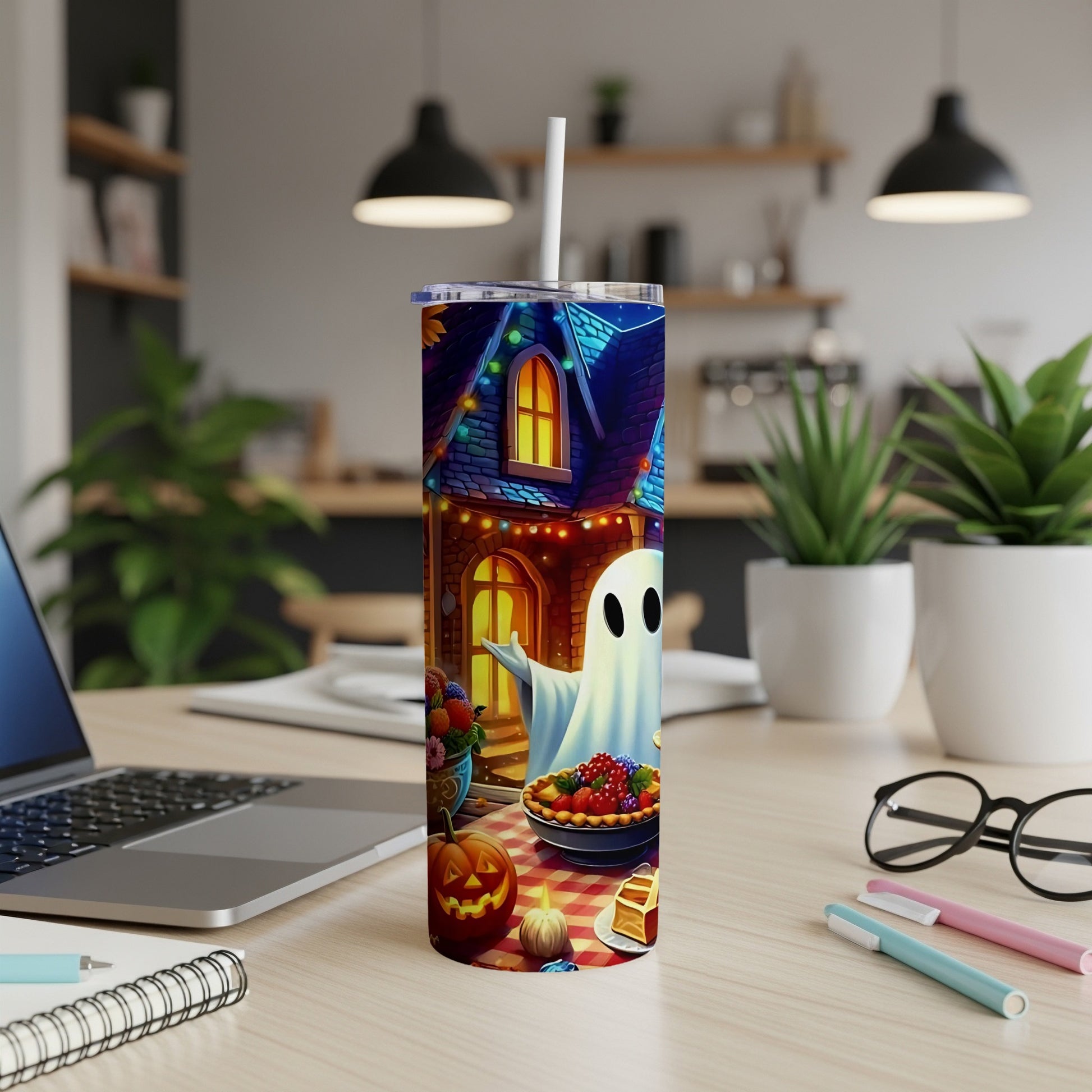 Halloween tumbler with ghost, haunted house, pie, pumpkin, and floral elements.