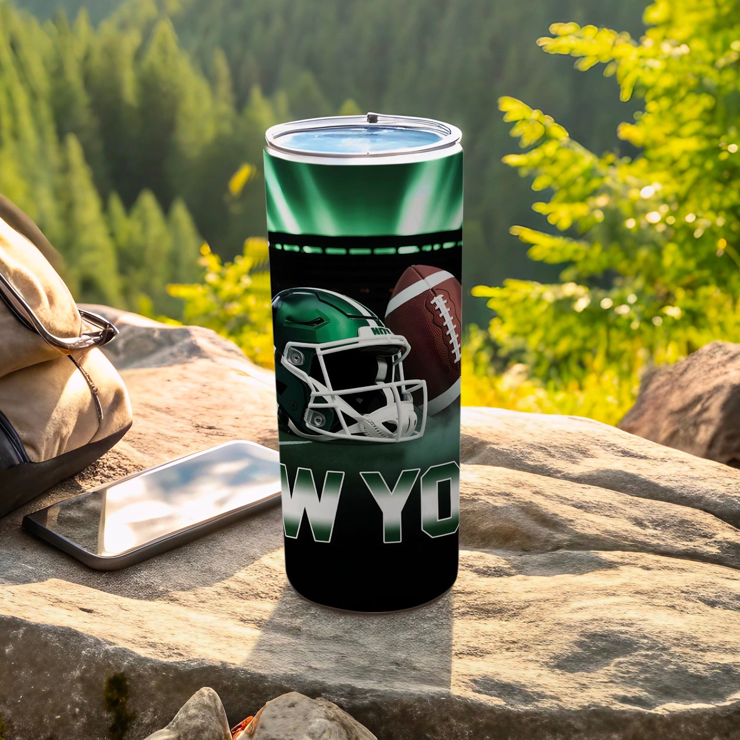 New York Jets football helmet and ball on a green tumbler.