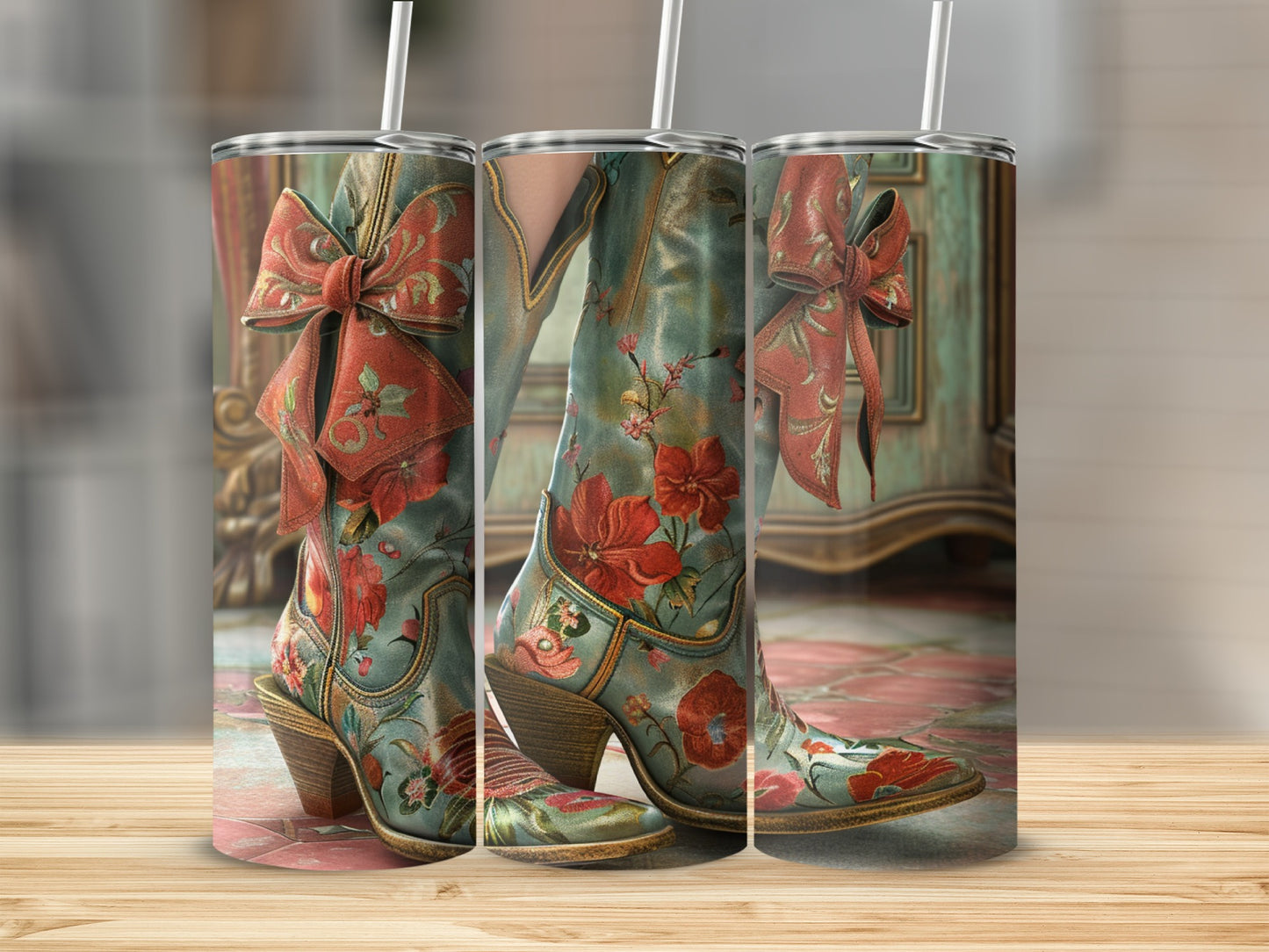 Turquoise cowboy boots with red floral print and bow accents.