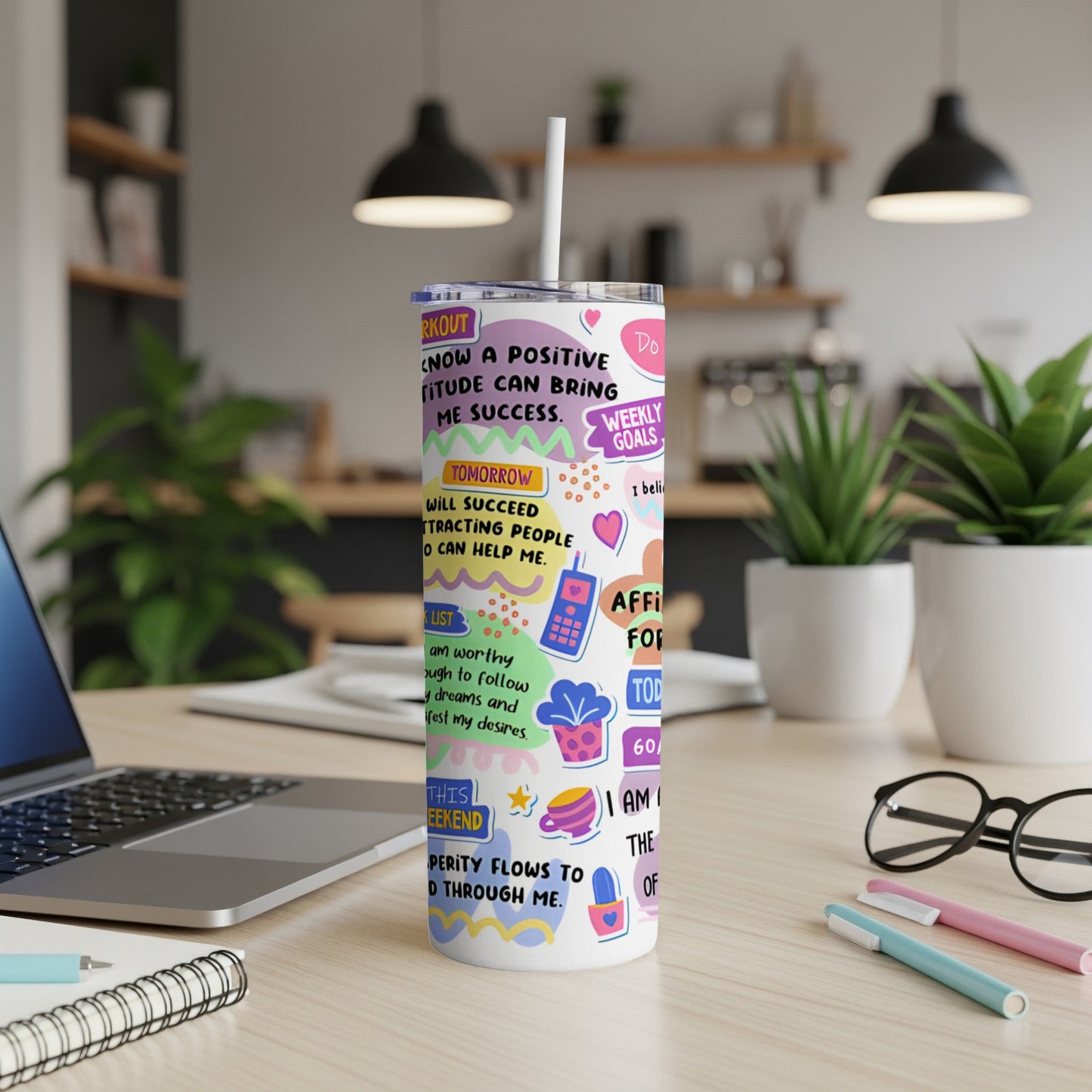 Tumbler with motivational quotes about success, goals, and prosperity.