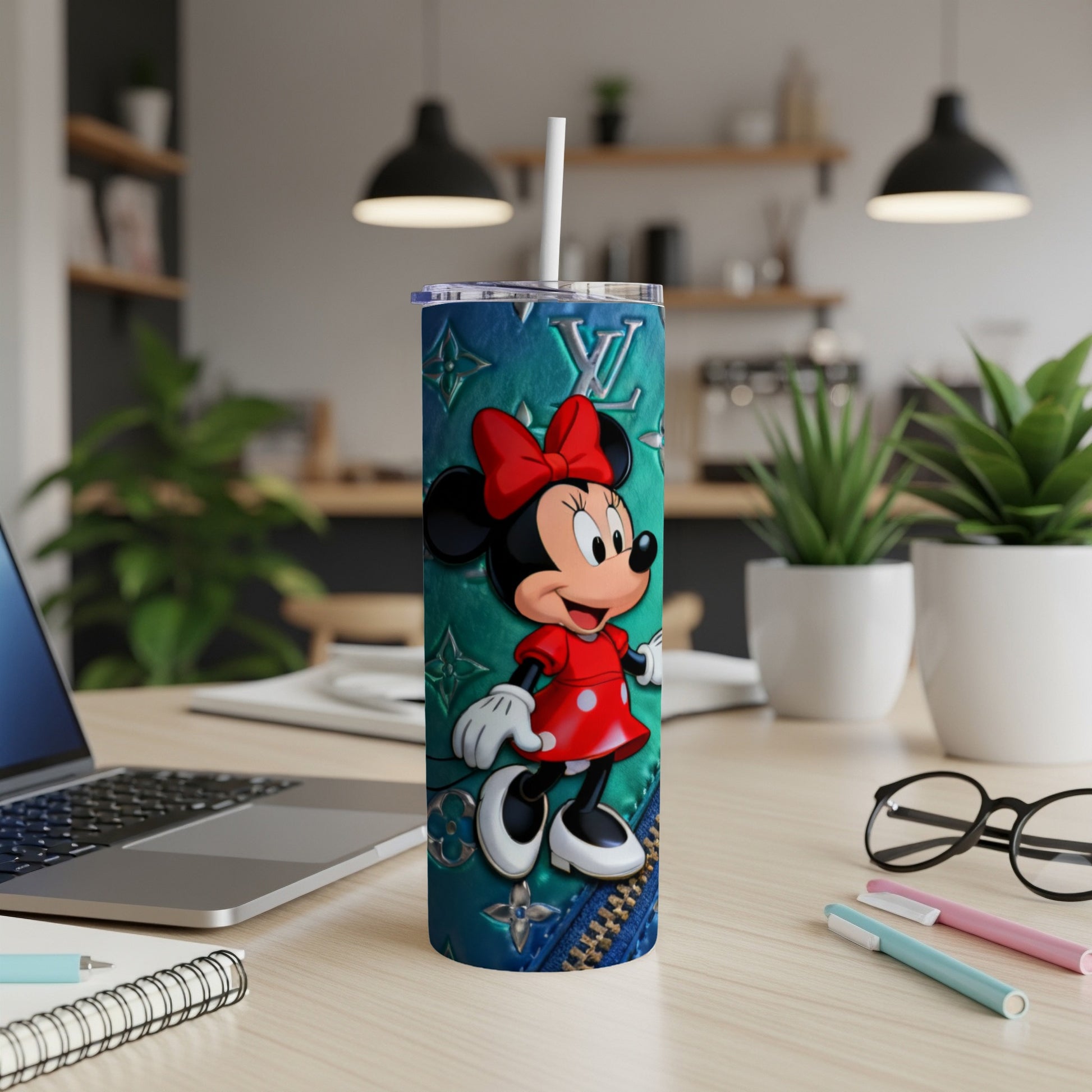 Minnie Mouse on a teal tumbler with faux leather and zipper texture.
