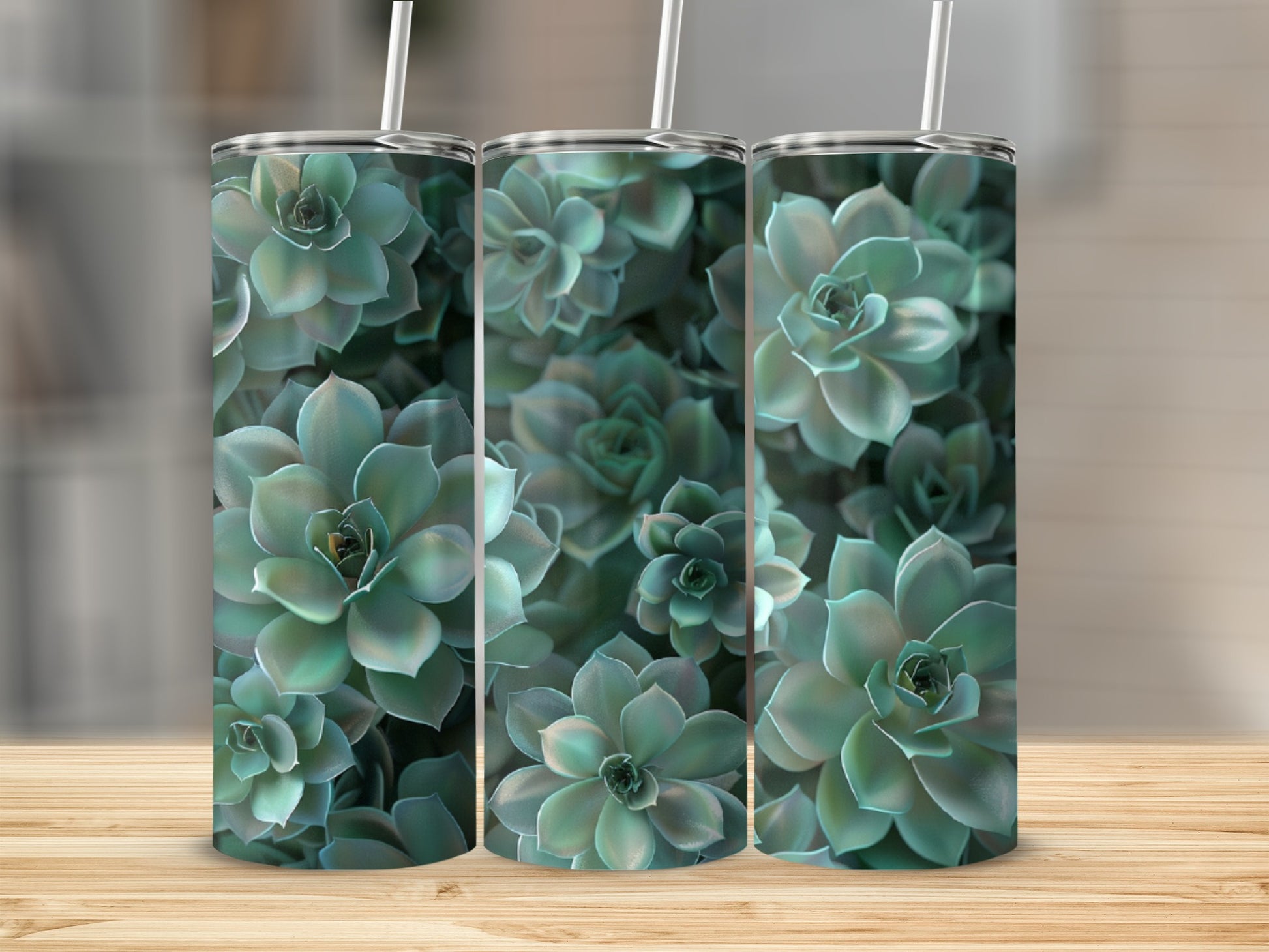 Three tumblers with a close-up pattern of green succulent plants.