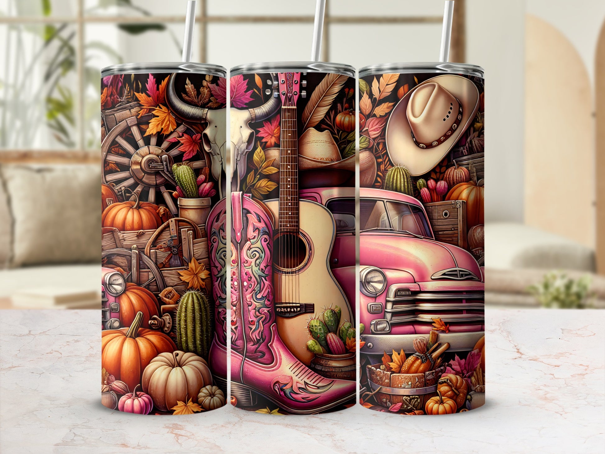 Pink guitar, cowboy hat, and pumpkins on a tumbler with Western motifs.