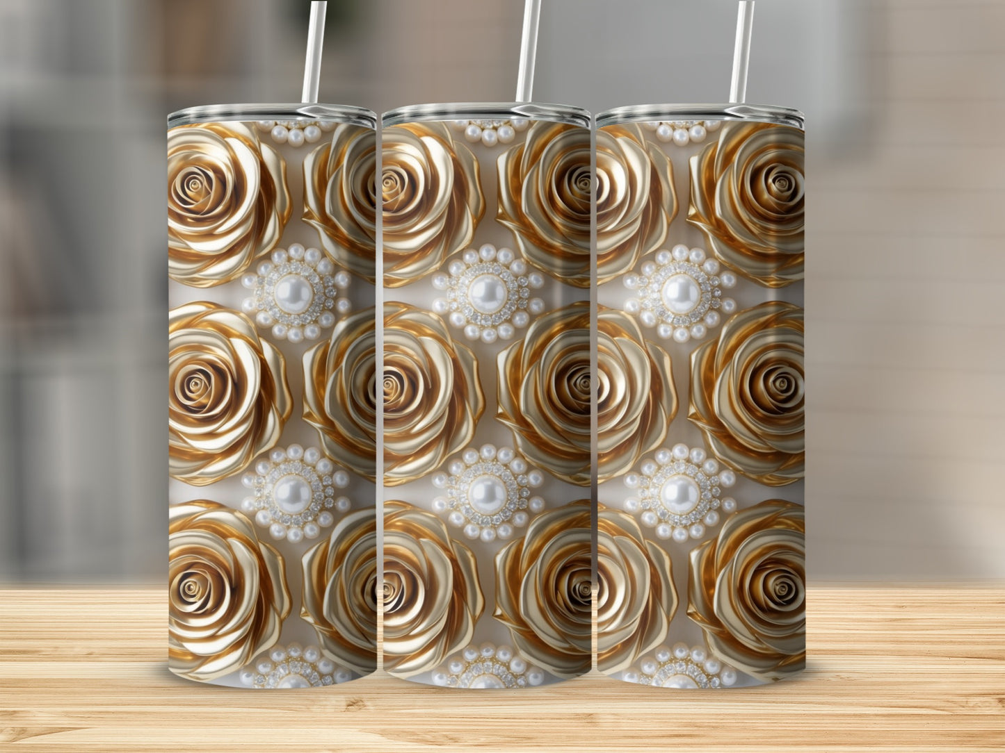 Gold rose and pearl pattern on three tumblers.