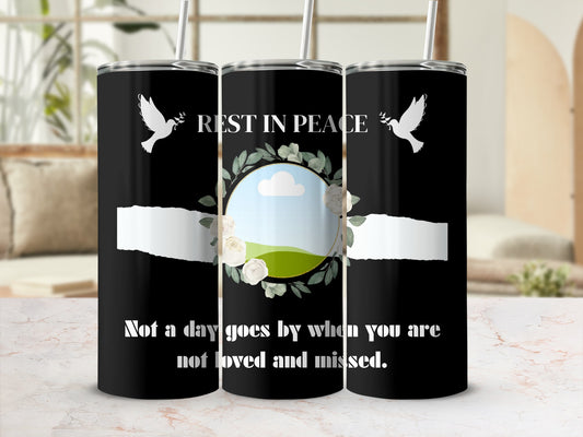 Tumbler with "Rest in Peace" text, doves, and memorial quote.