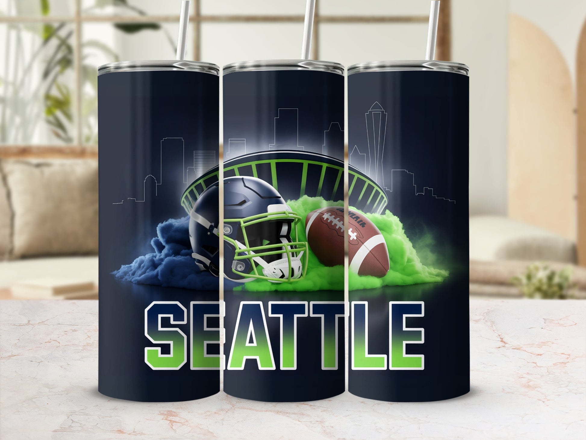 Seattle Seahawks helmet, football, and stadium graphic on three tumblers.